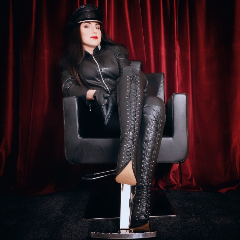 Vinyl Queen wears Charlotte Luxury Leather Boots and a Leather Jacket.